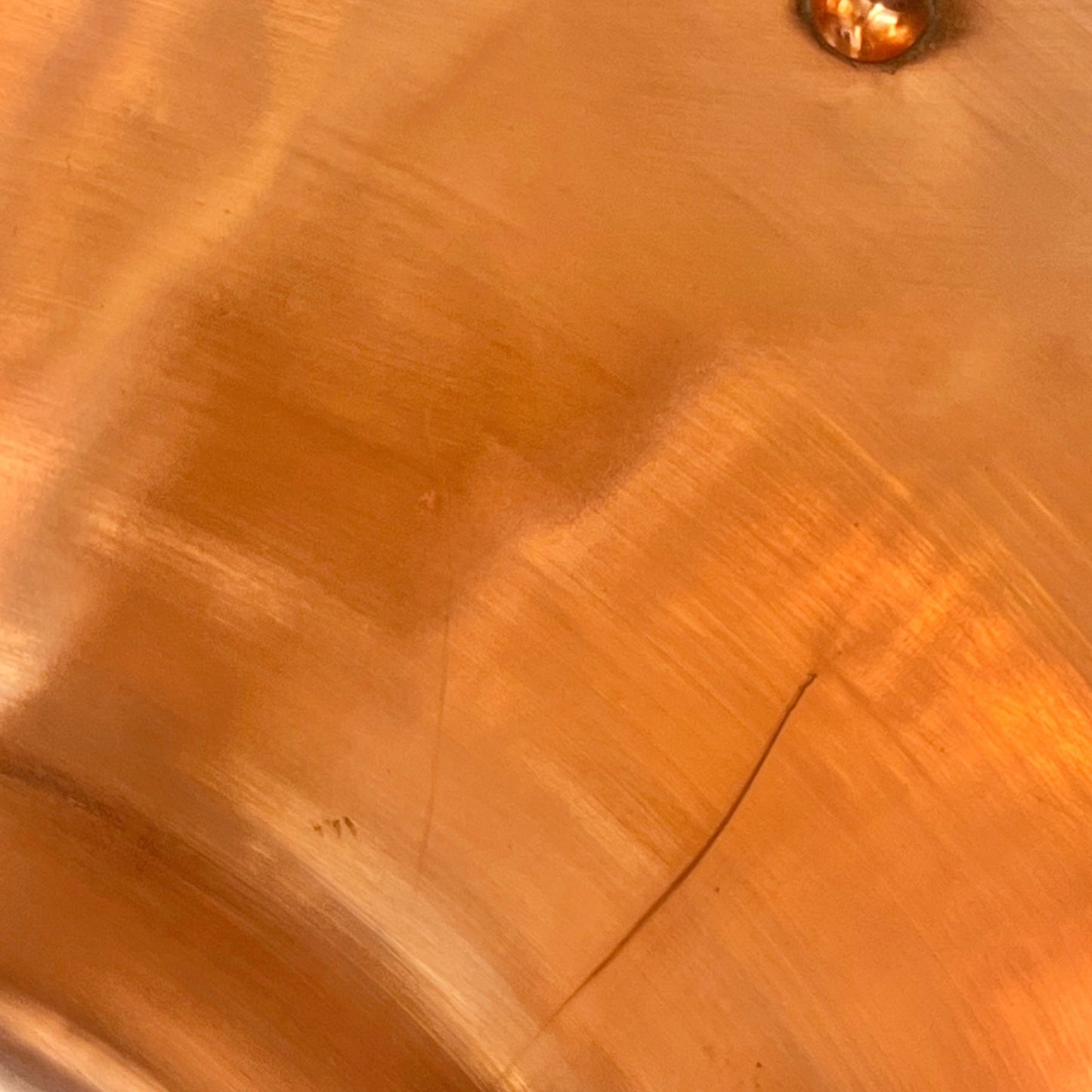 Copper upcycled basin sink or washbowl showing wear and tear