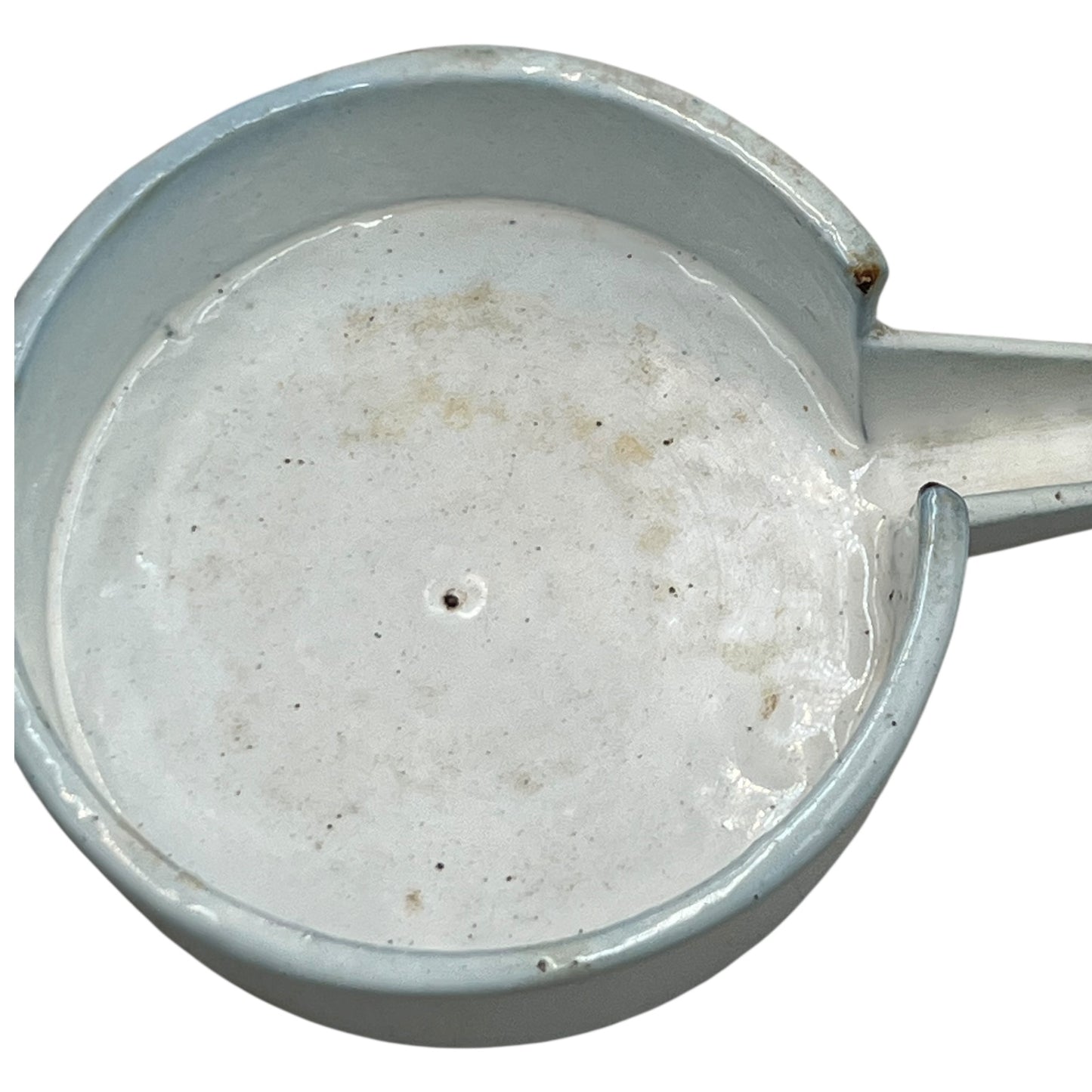 Close-up of a vintage French fruit press with an enamel pot on a white background