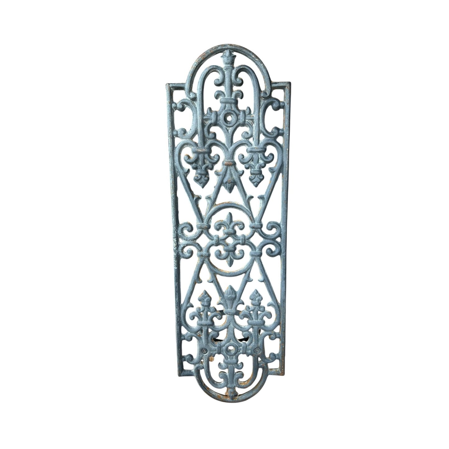 close up of a metal decorative wall planter on a white background