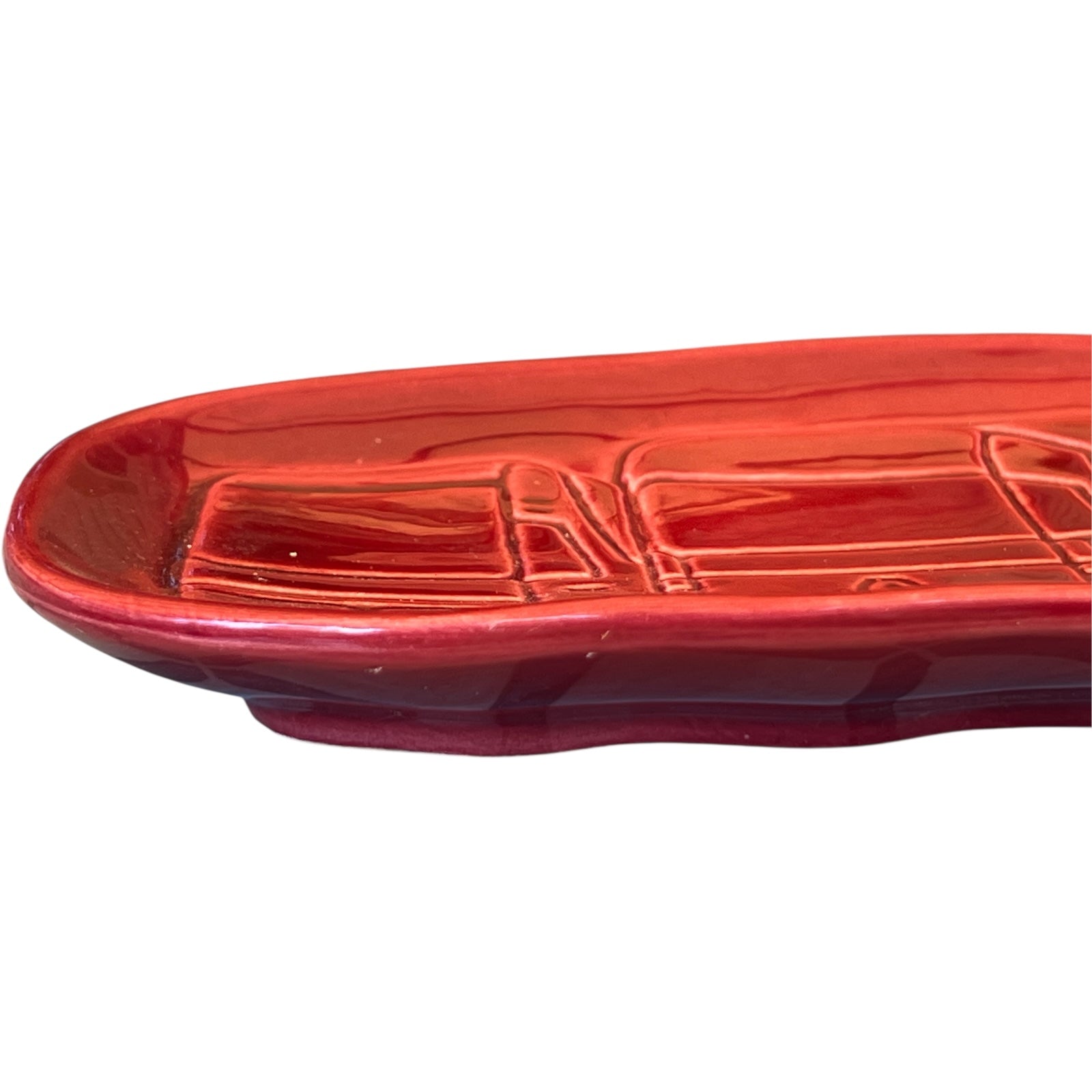 Renault Truck Collectible Trinket Tray, dark red oval shaped with a truck design on the front