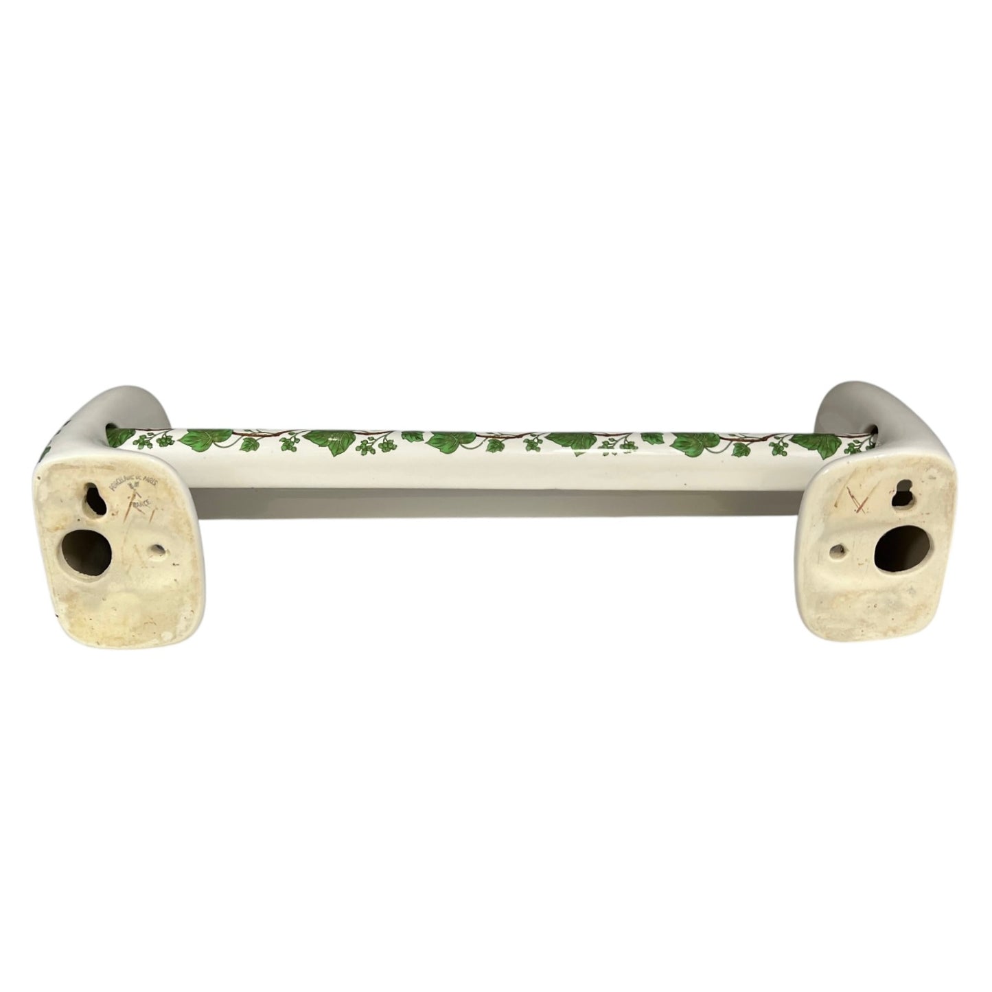 White and green leaf patterned towel rails and end brackets rear view on a white background