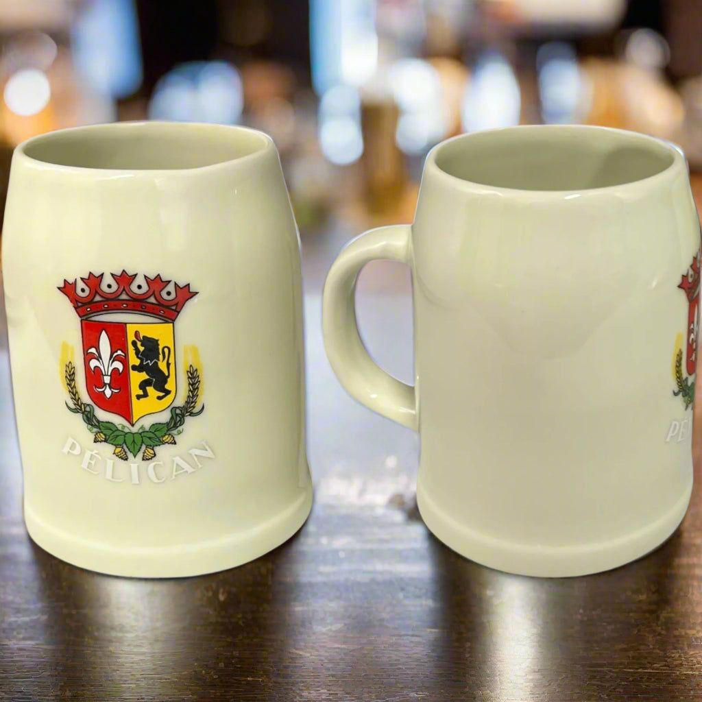 Pair of Traditional Belgium Beer Steins 0.3L, Pelican Biere Tankards on a bar top
