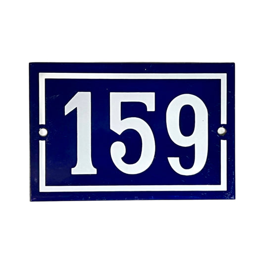 A rectangular blue house number plaque with white border and white numerals '159' on a plain white background.
