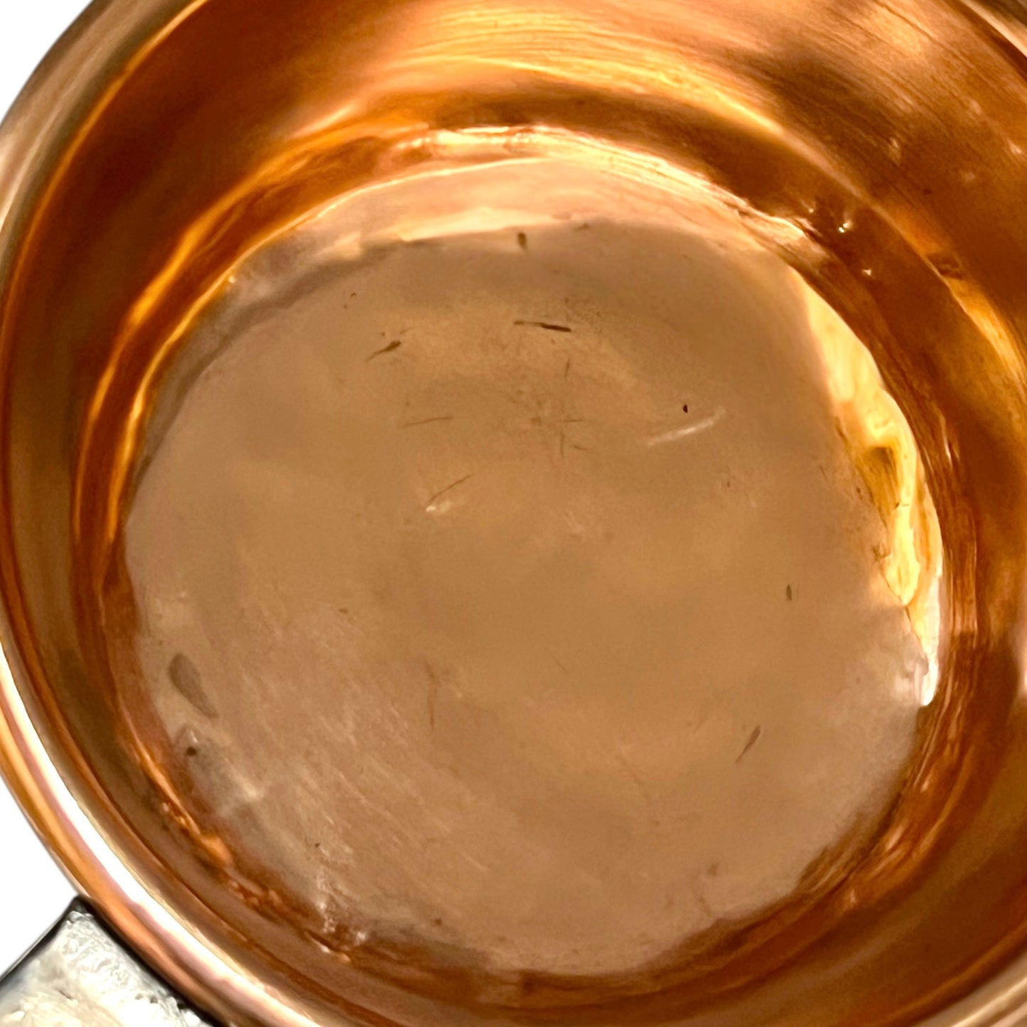 Close-up of a copper pot on a white background