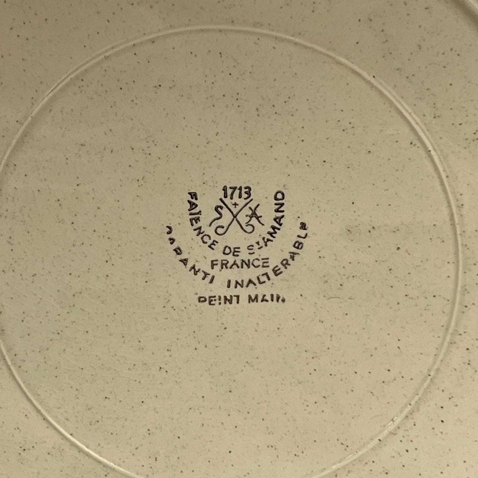 makers stamp on back of fondue plate