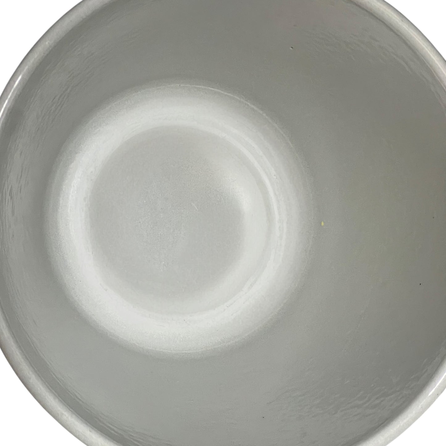 Close up of a Le Creuset pot on a white background