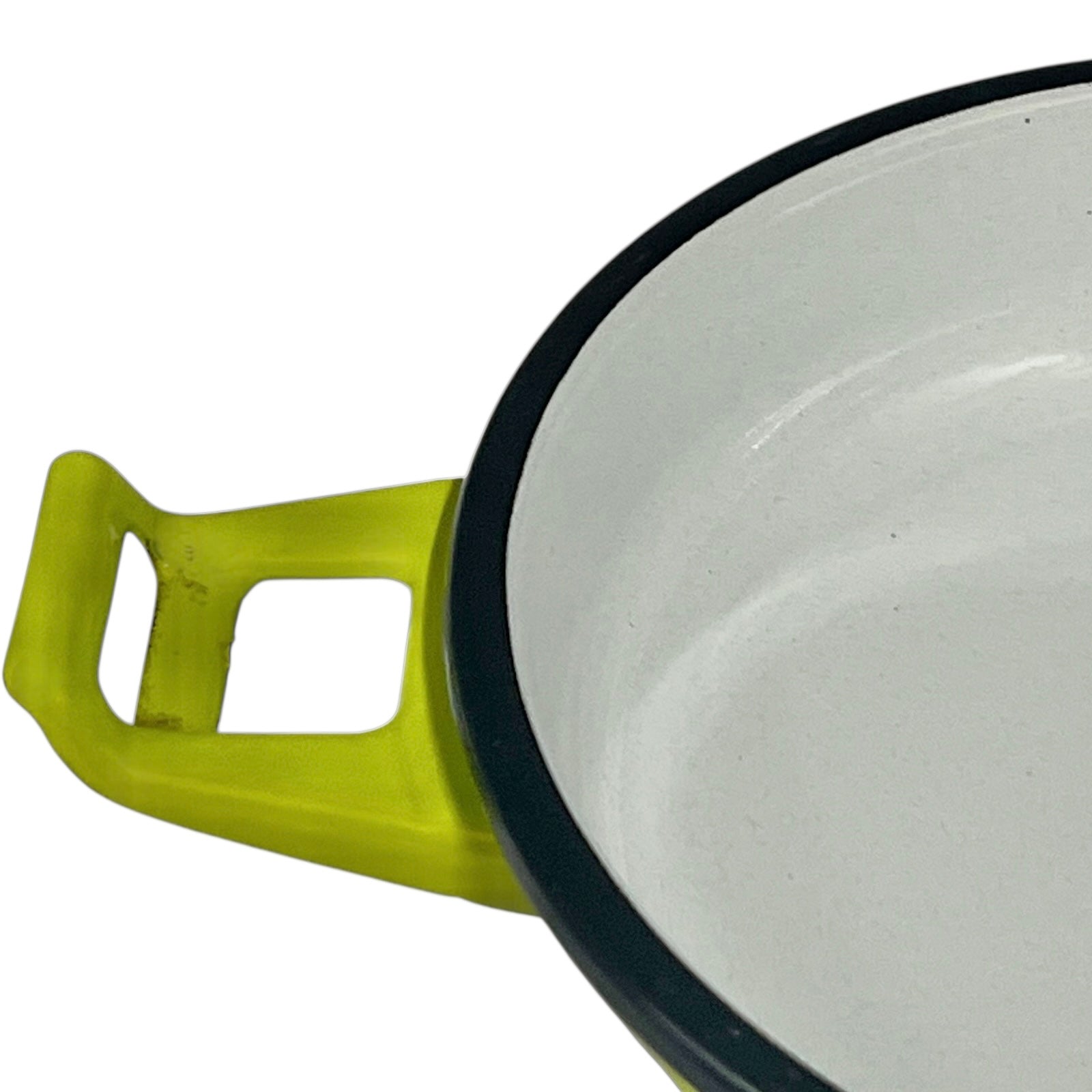 Close-up of a green-handled white enameled cast iron skillet on a white background