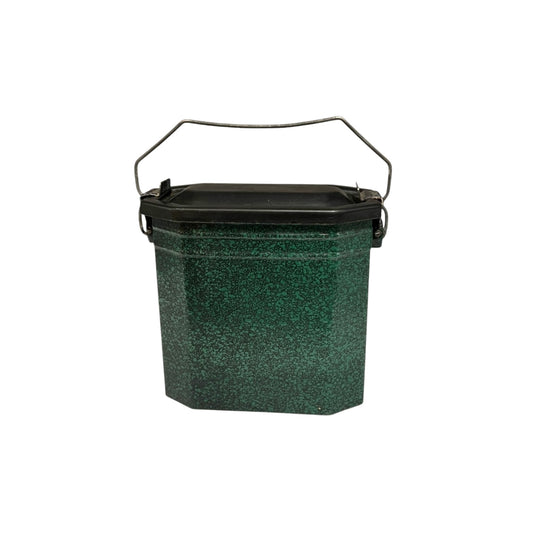 Small green French vintage enamel graniteware lunch box lunch pail with a black lid and metal handle on a white background