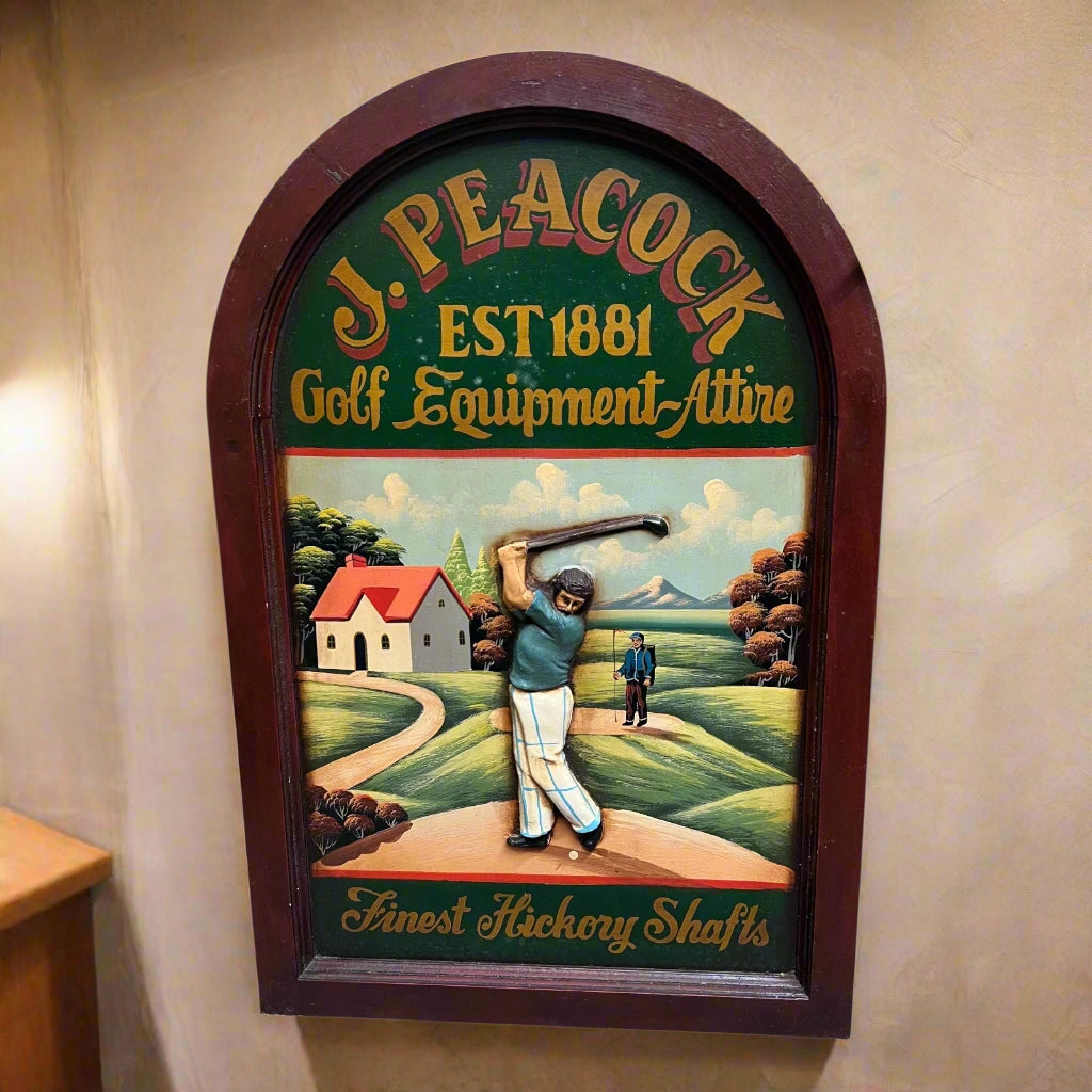 Decorative wooden pub style sign for J. Peacock golf equipment with a golfer and landscape illustration for sale by All Things French Store.