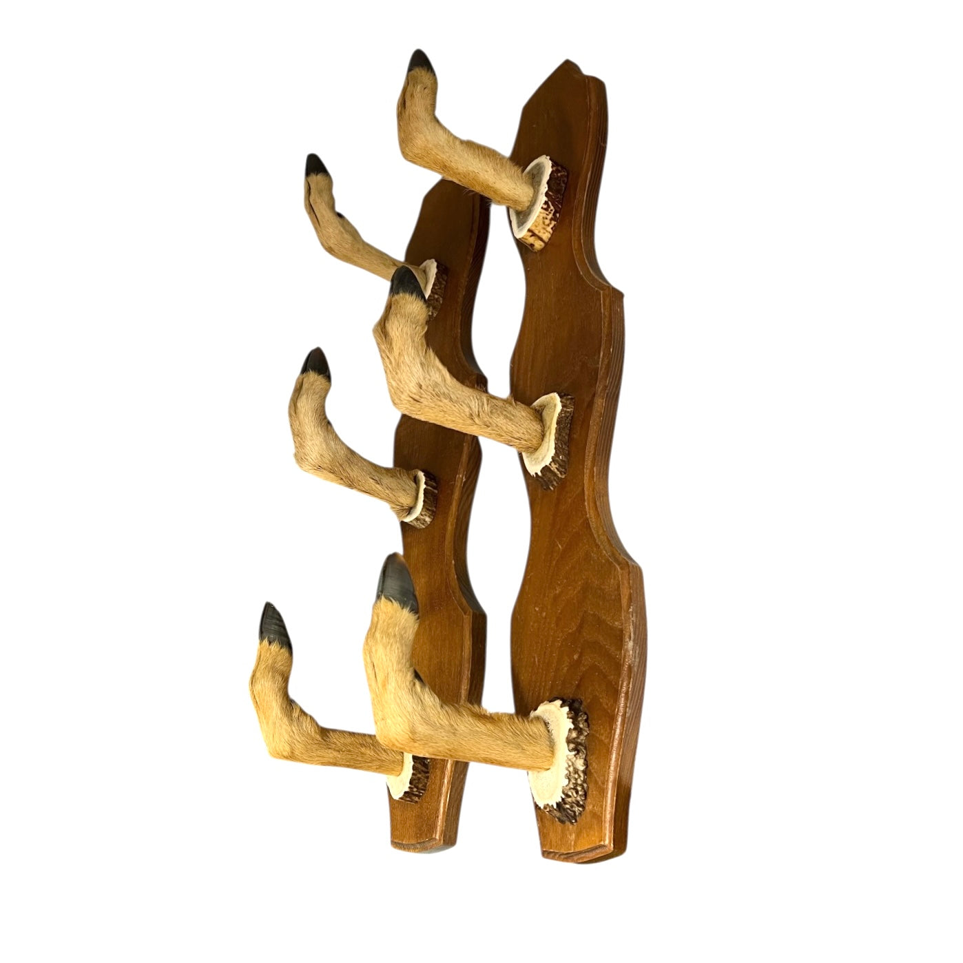 Two wooden wall hooks with deer hoof designs on a white background