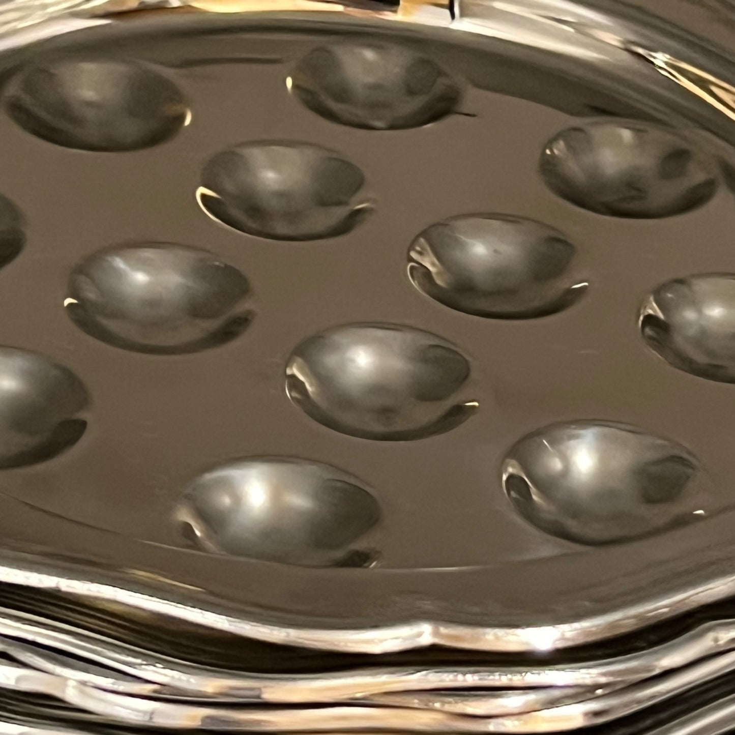 close up stainless steel snail plate
