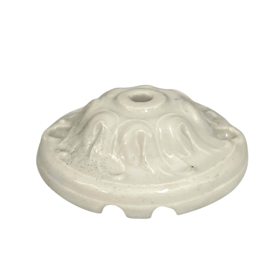 White ceramic lamp ceiling rose with decorative patterns on a white background for sale from All Things French Store