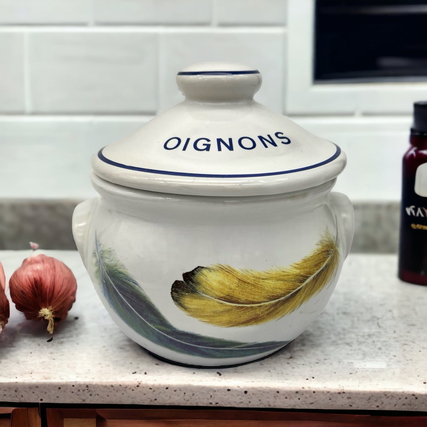 image small  French farmhouse kitchen style onion storage pot  on a kitchen countertop