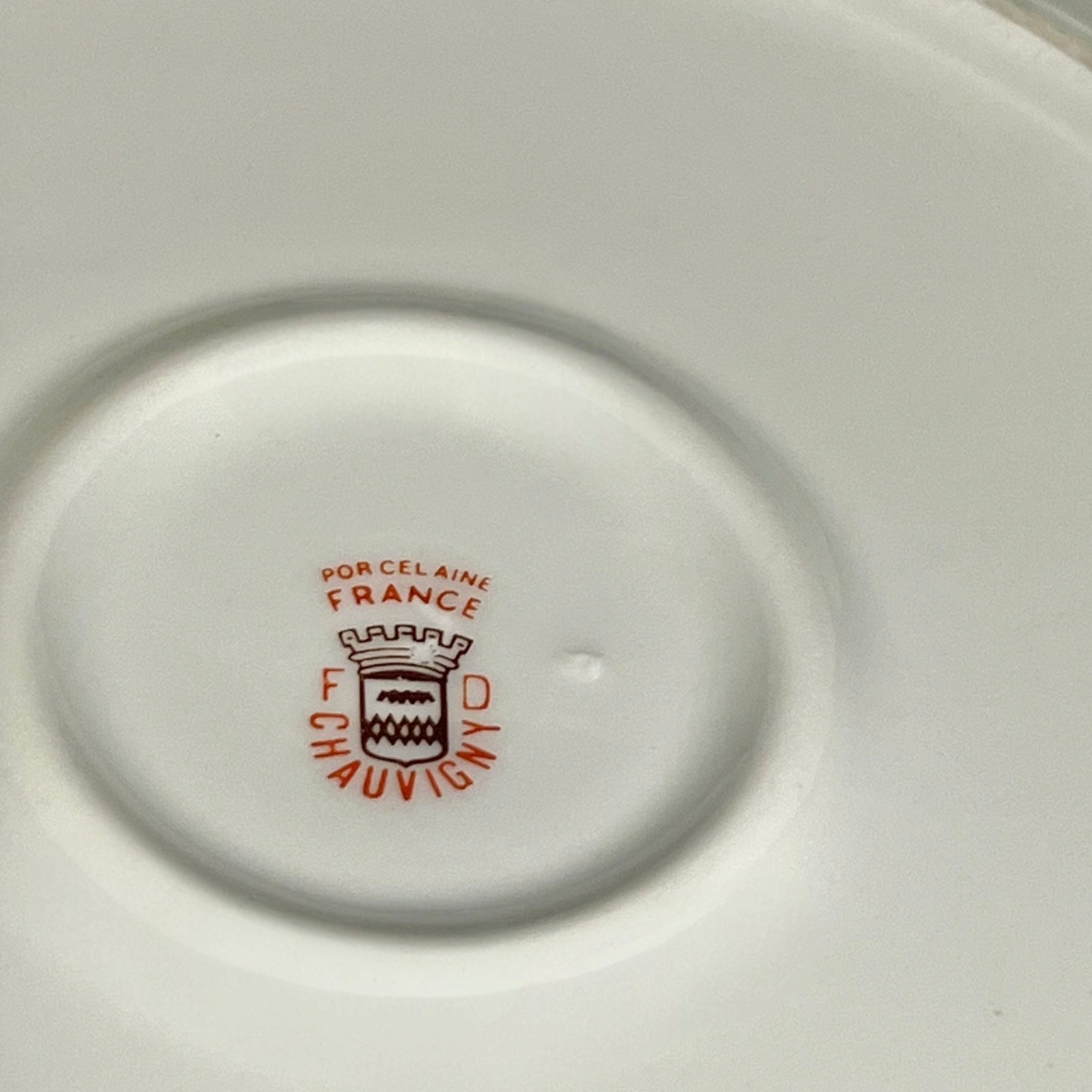 Porcelain plate with 'Porcelaine France' branding on a white background