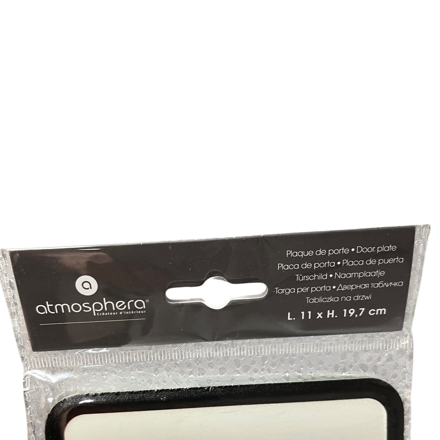 Packaged door plate with 'atmosphera' branding on a white background