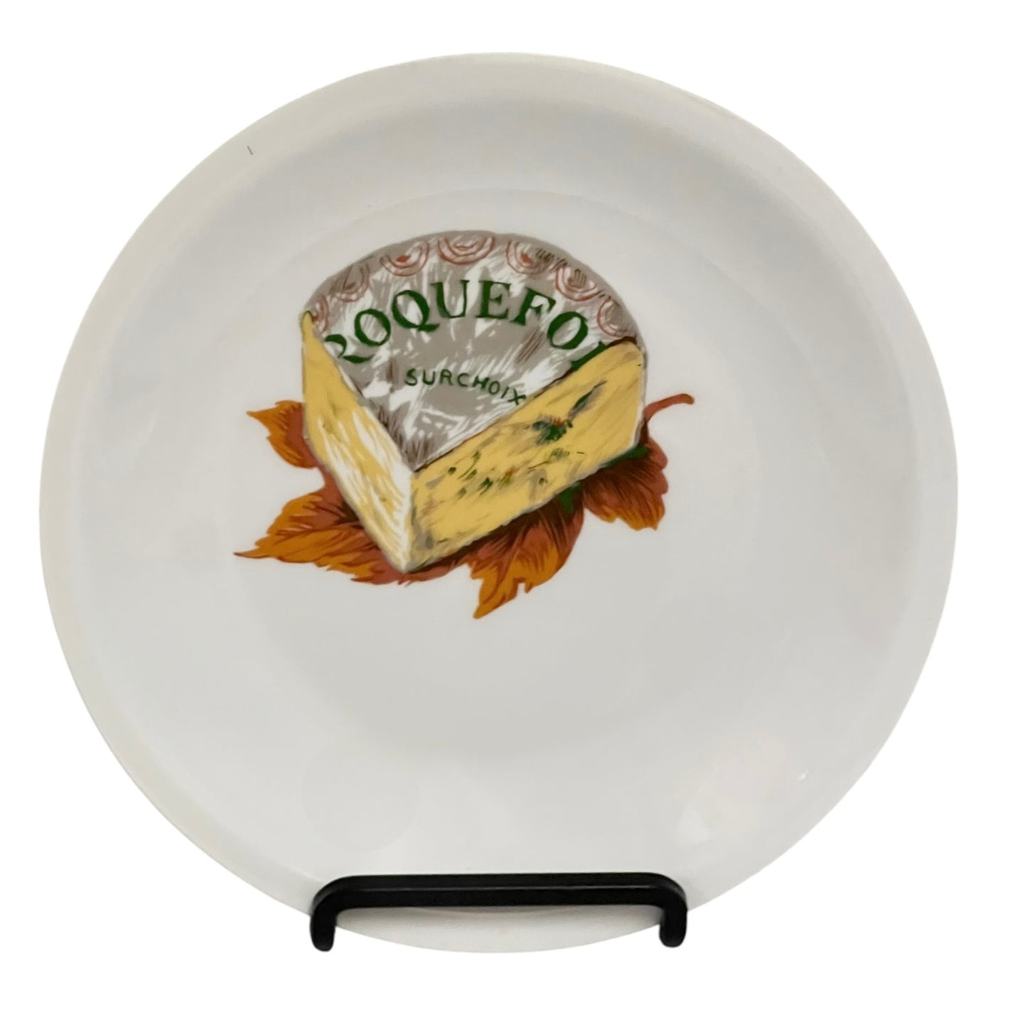 Roquefort cheese on a decorative plate with a white background