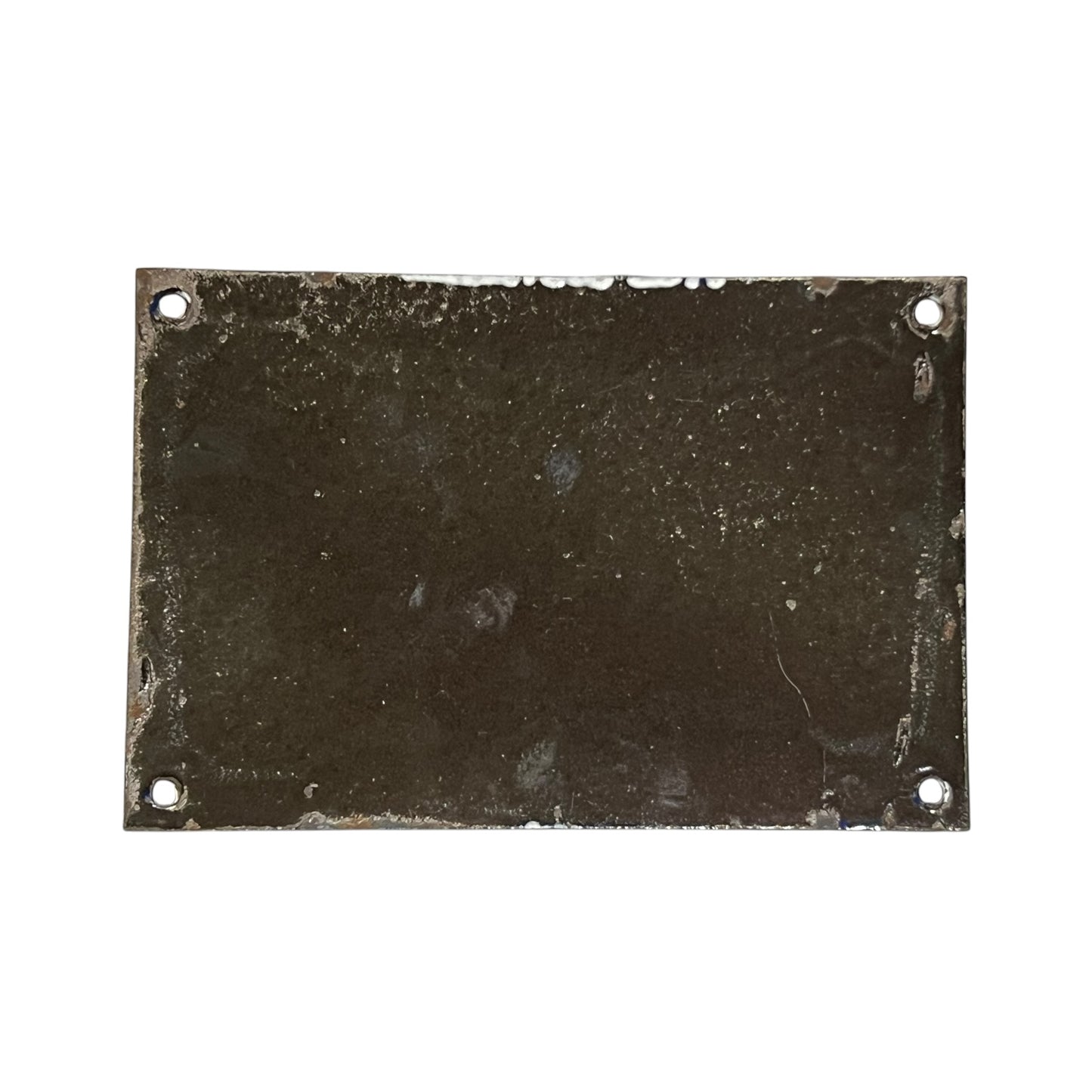 Rectangular metal plate with four holes on a white background