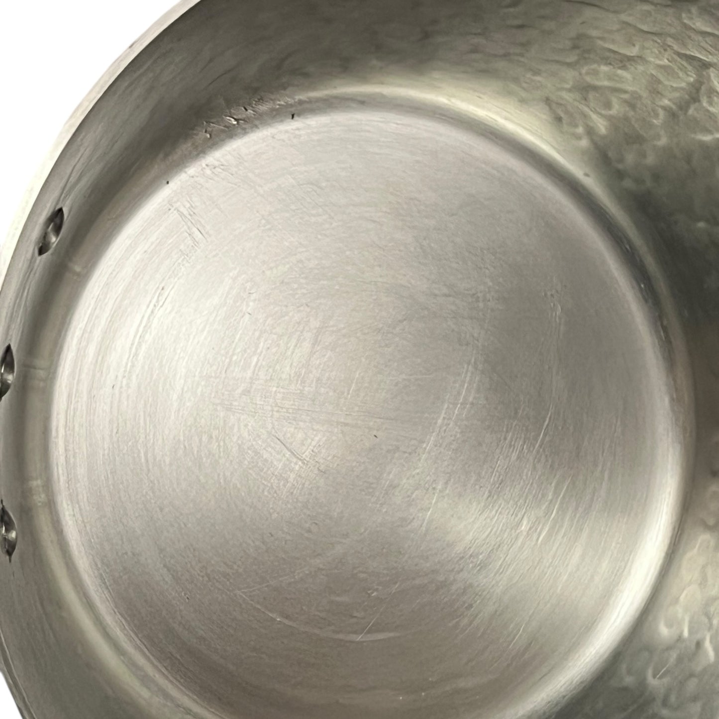 inside lining of copper saucepan