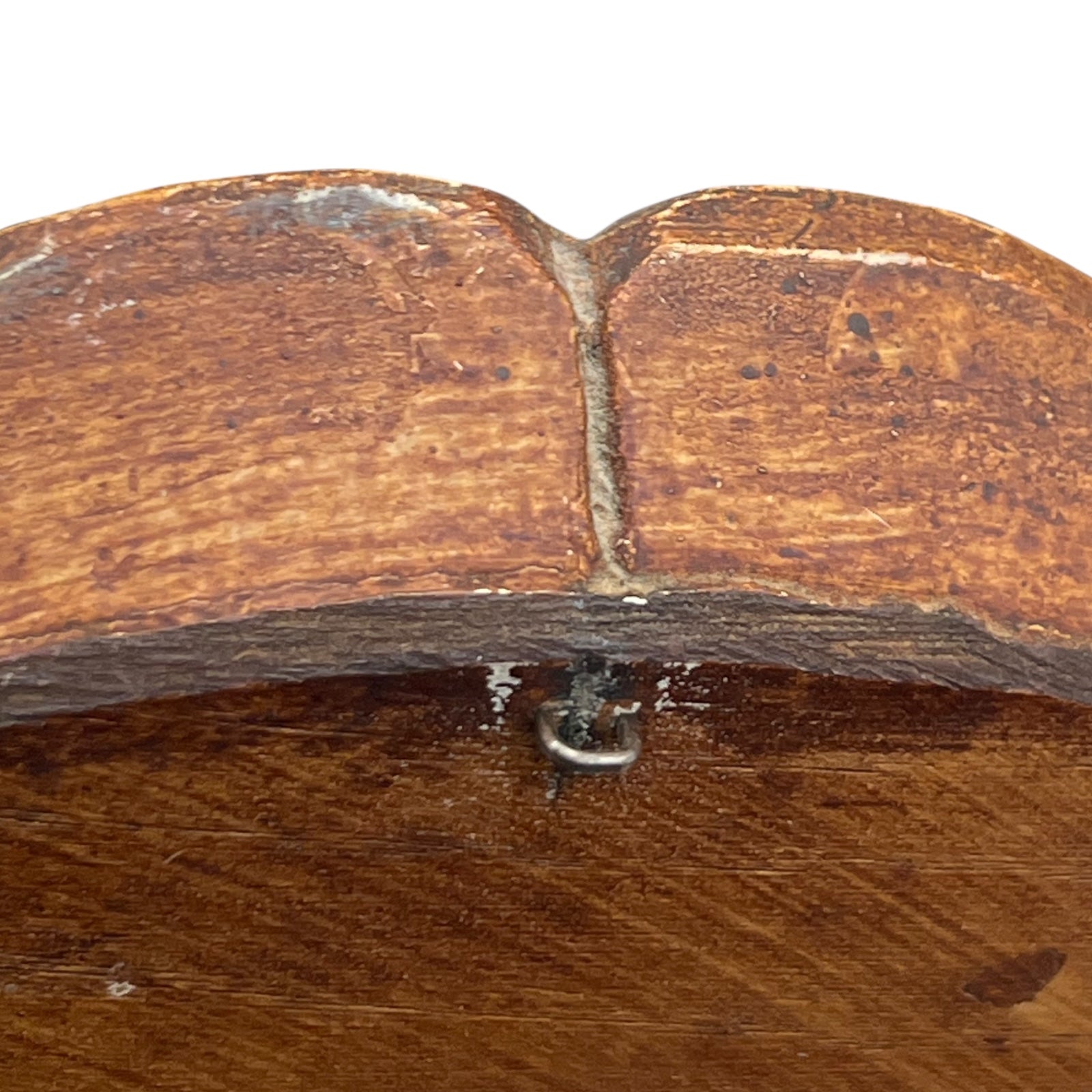 back of wooden plaque with hook