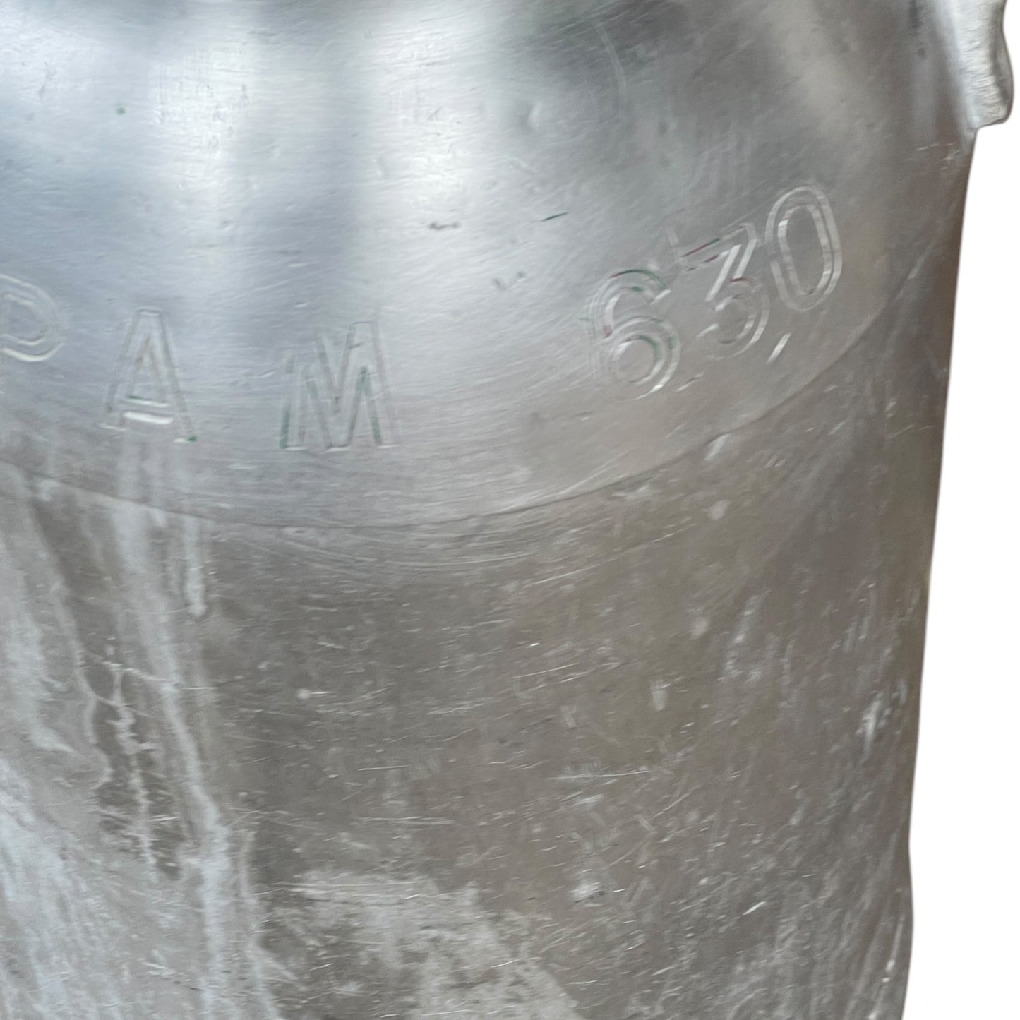 close up of milk churn