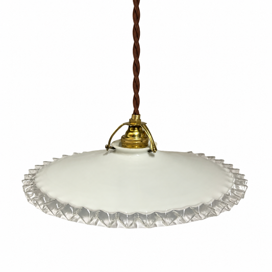 A vintage-style pendant light with a white scalloped glass shade, a brass metal fixture, and a brown twisted cord, shown against a plain white background.