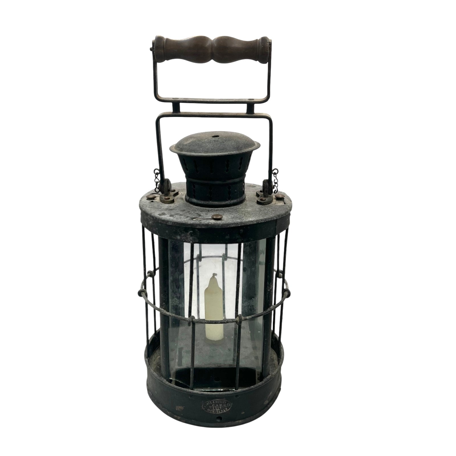 Vintage black lantern with a wooden handle on a white background
