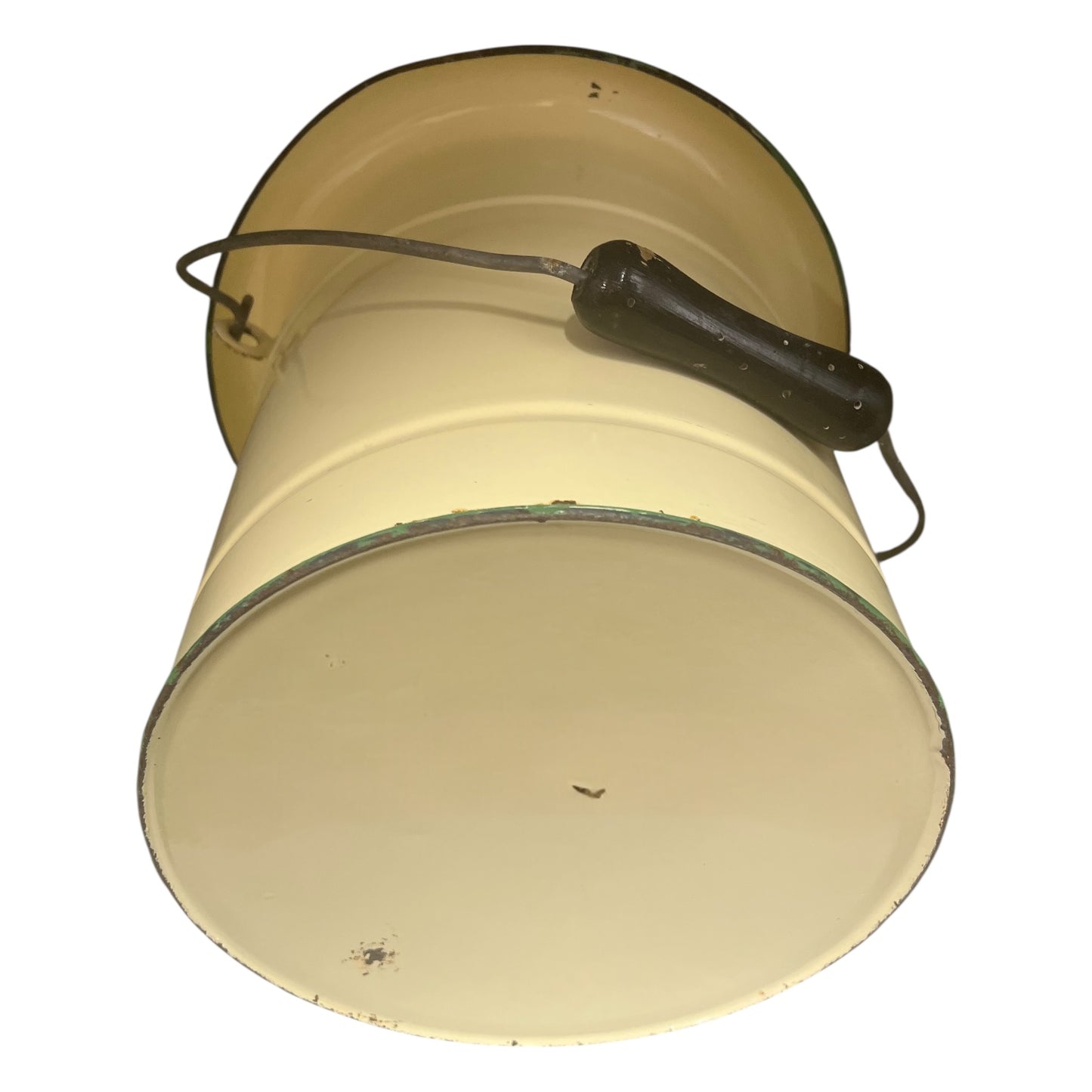 Close up of French vintage cream and green enamel bucket with a lid and handle on a white background