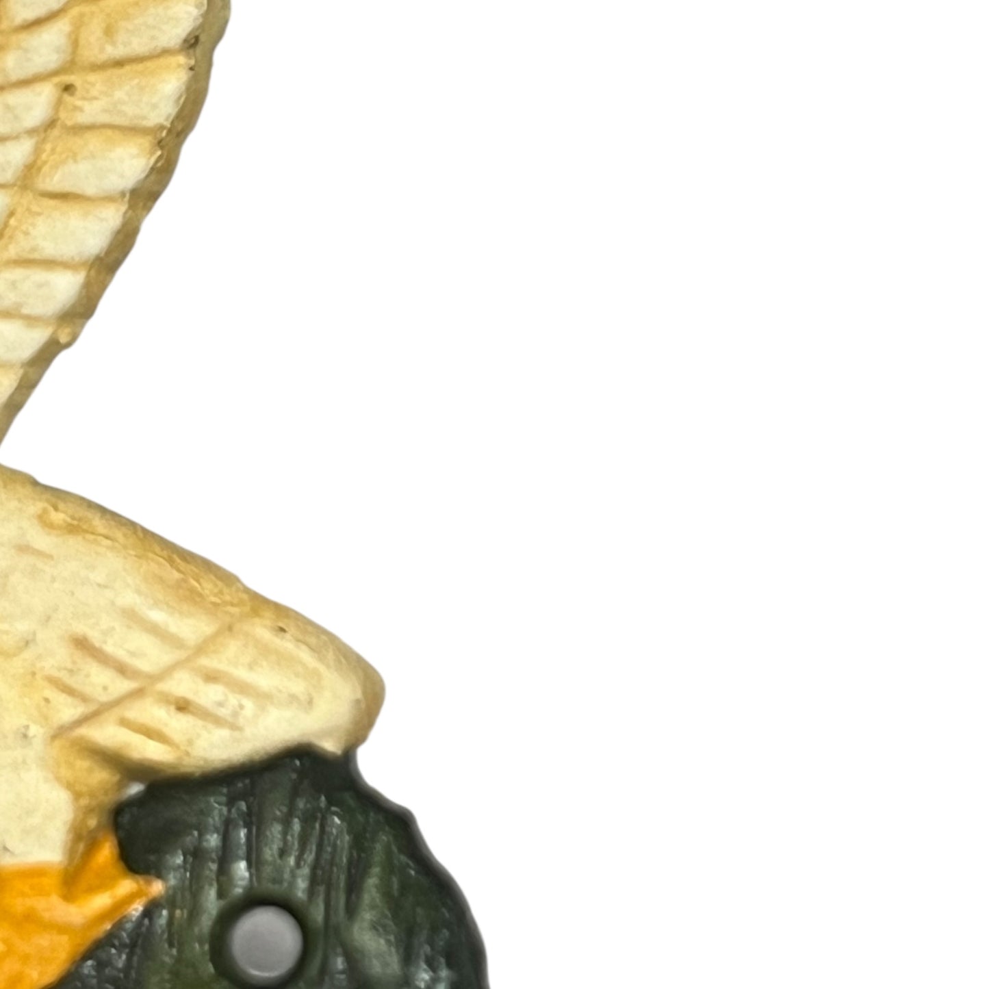 close up of goose toilet paper holder on a white background