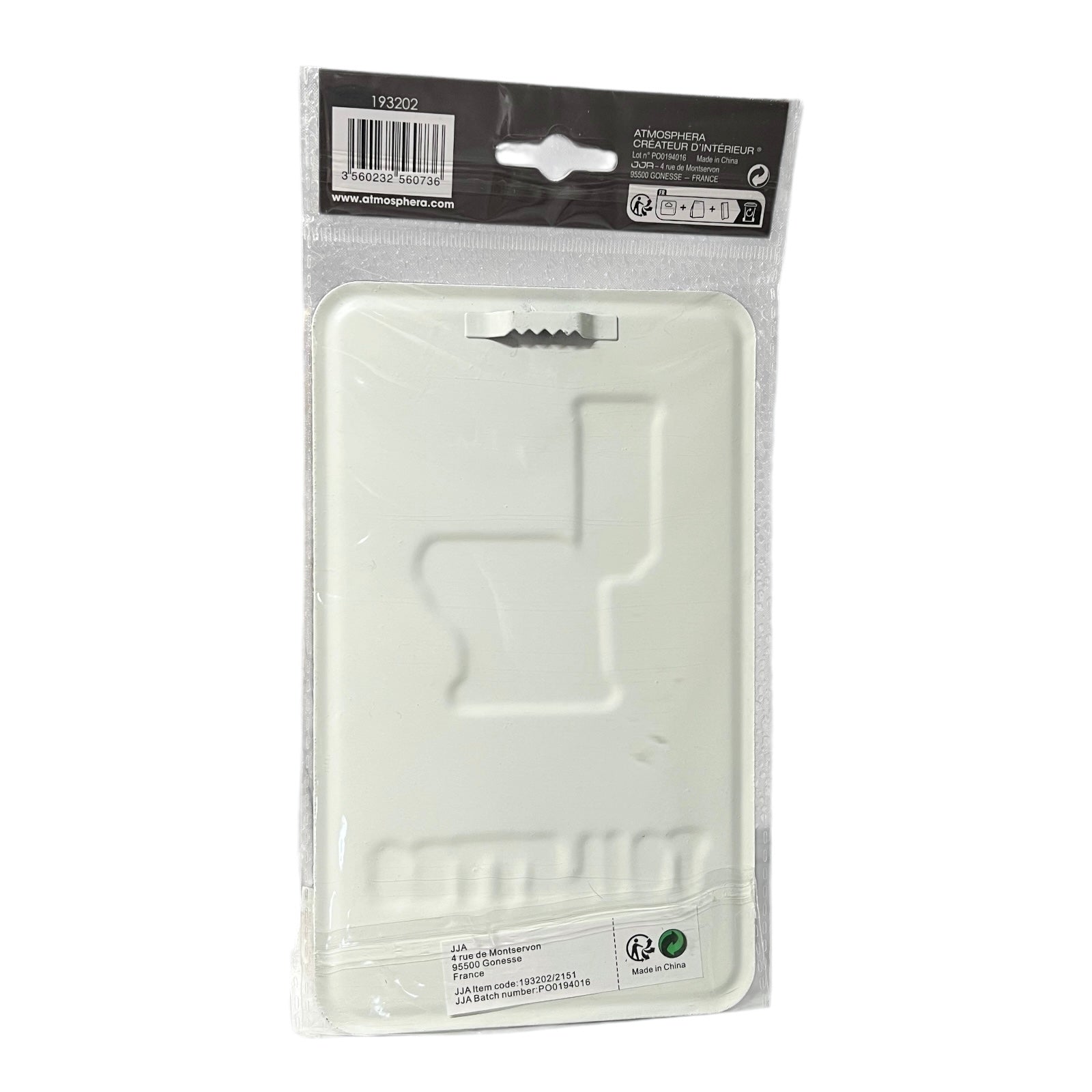 White plastic component in clear packaging with a black label on a white background