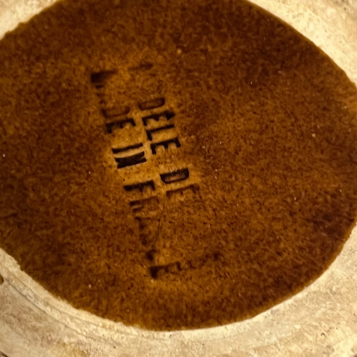 close up image of escargots plate makers stamp