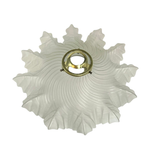 Frosted glass lampshade with a gold fitting on a white background