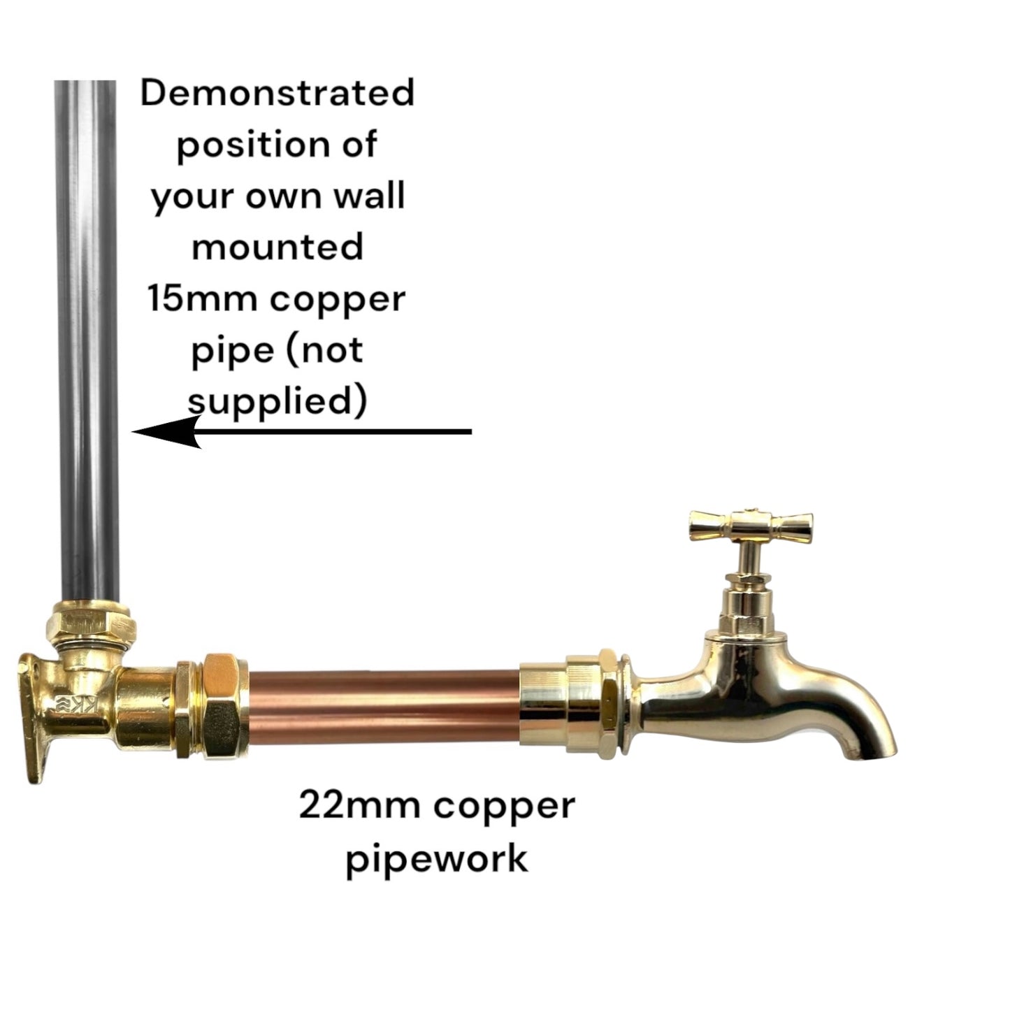 Brass and copper kitchen or bathroom wall taps on a white background