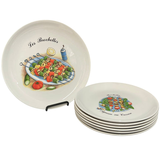 Set of ceramic plates with food illustrations and 'Les Brochettes' text on a white background