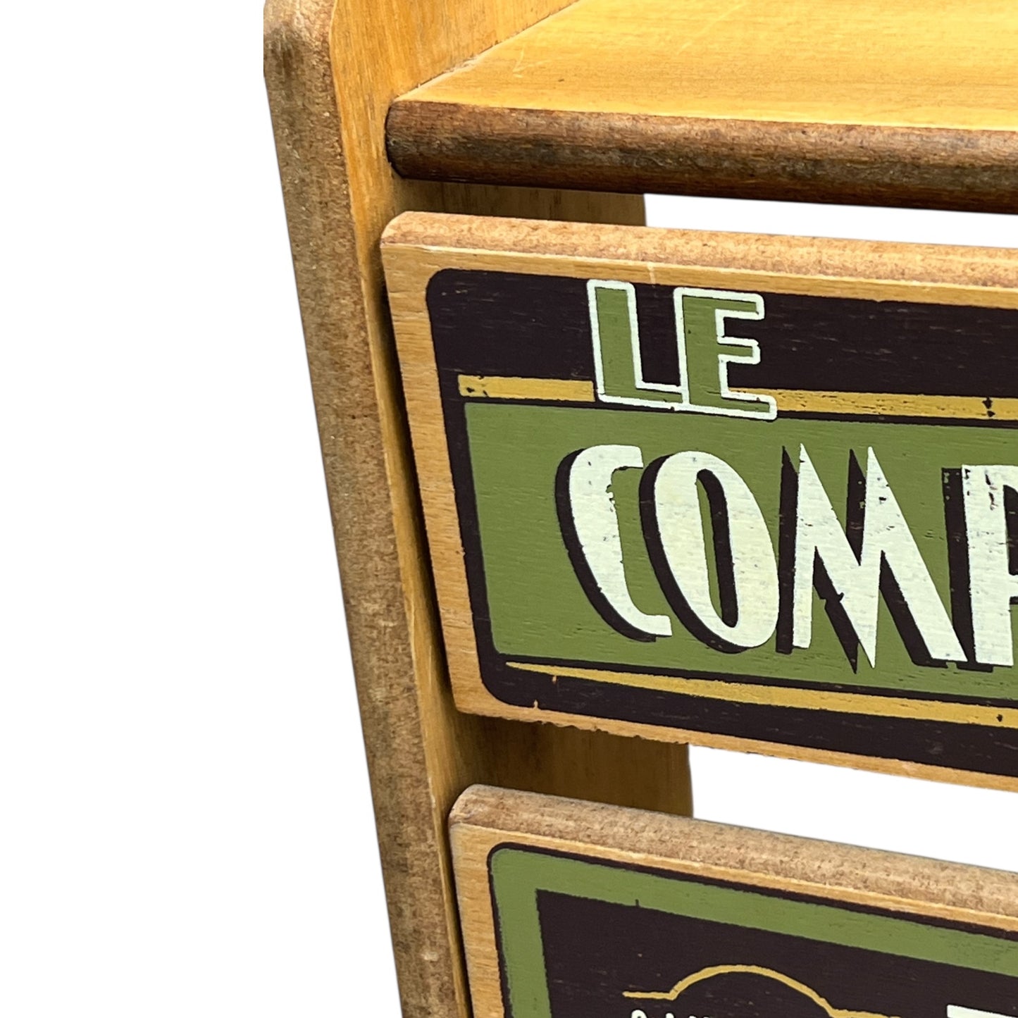 close up of French paper towel dispenser on a white background
