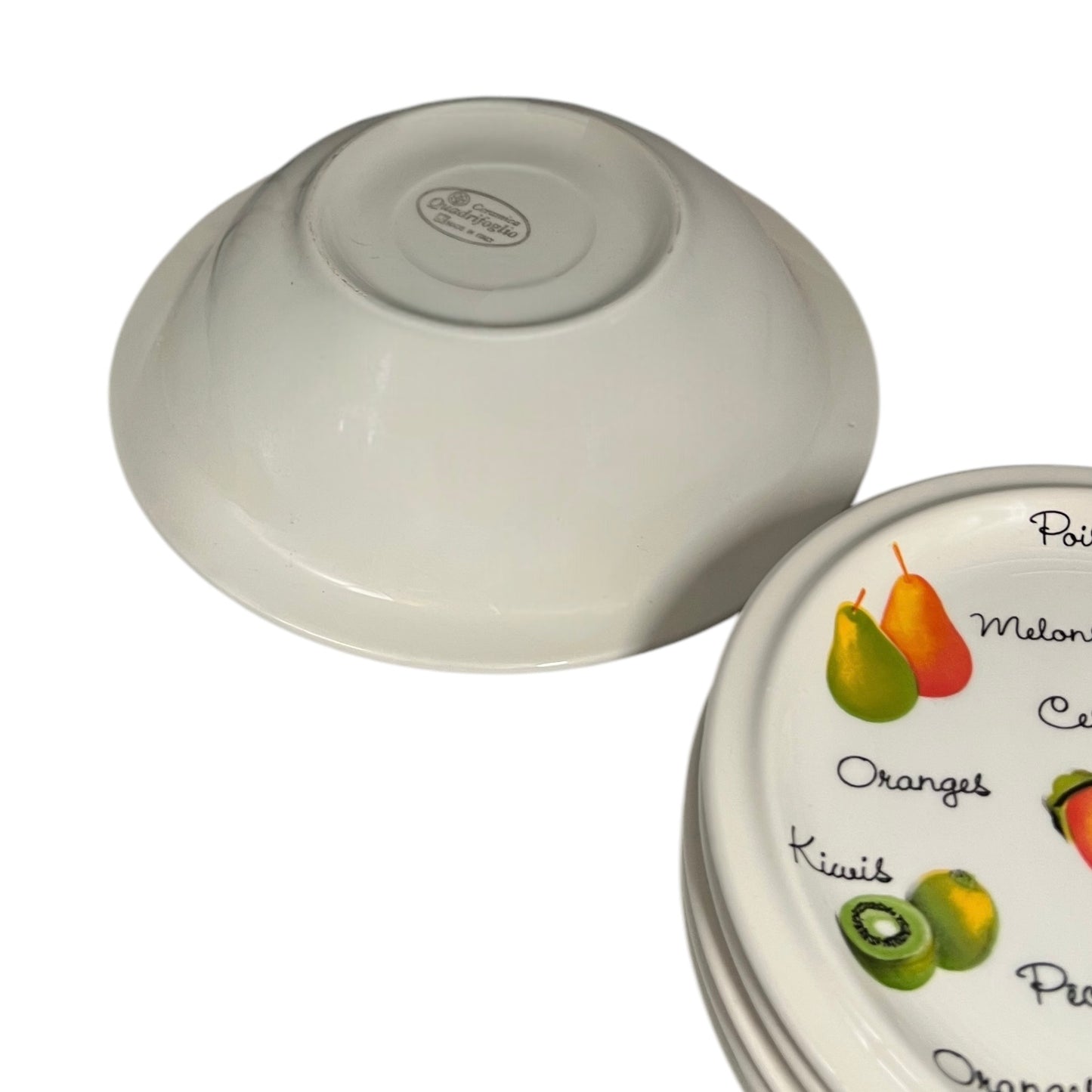 Fruit plate decorated with fruits and French fruit names and a matching bowl
