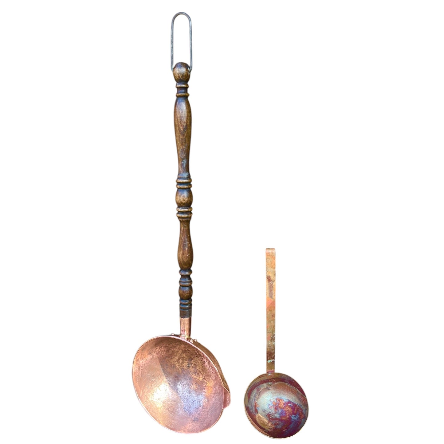 large coper ladle alongside small ladle to show scale