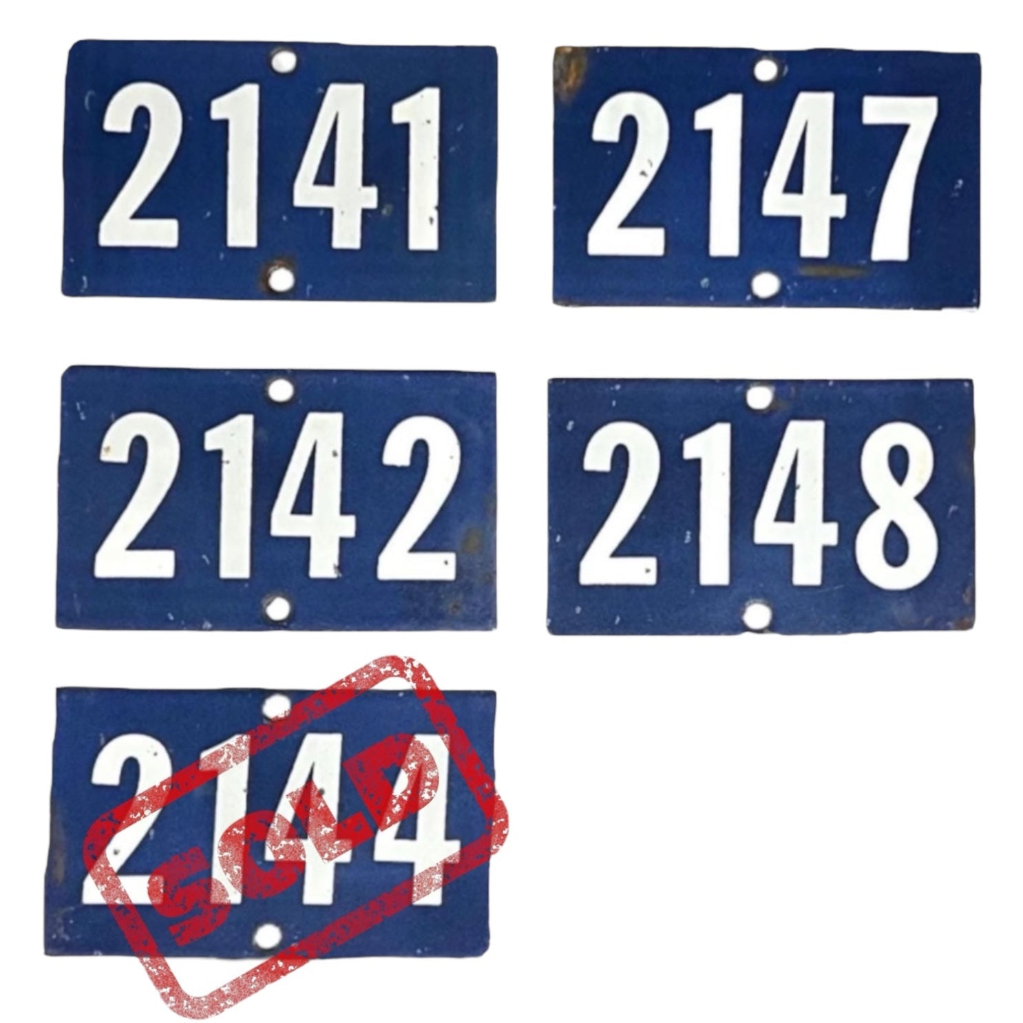 A selection of blue enamel door numbers with white numerals, ranging from 2141 to 2149, with one number crossed out with a red stamp-like mark.