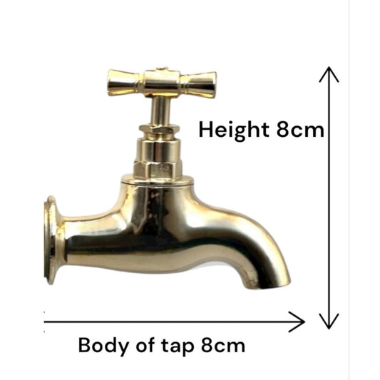 Gold faucet with measurements indicated on a white background