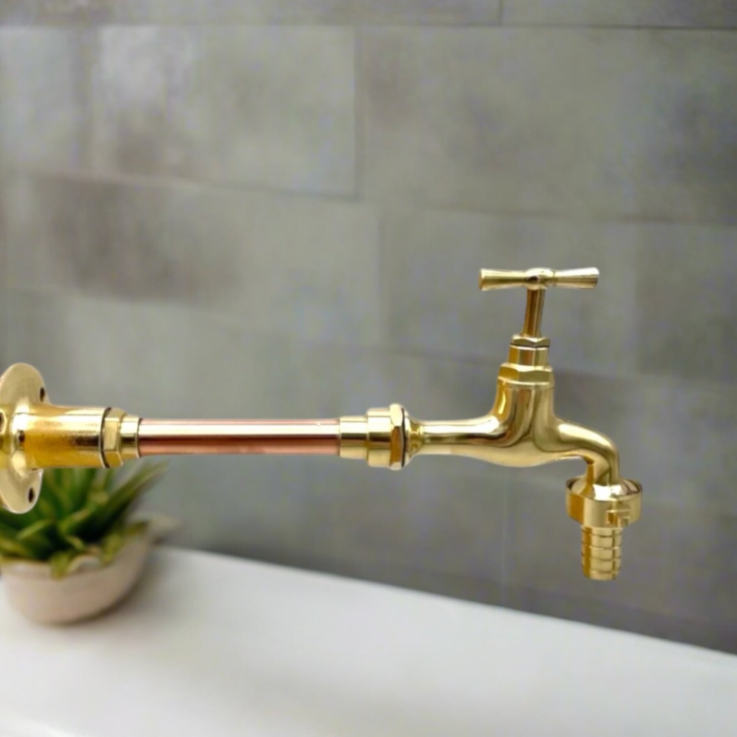 copper and brass wall tap