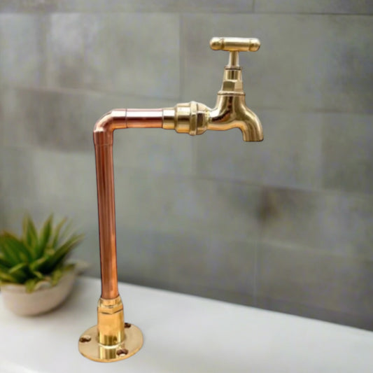 Copper and brass tap with a small tap head