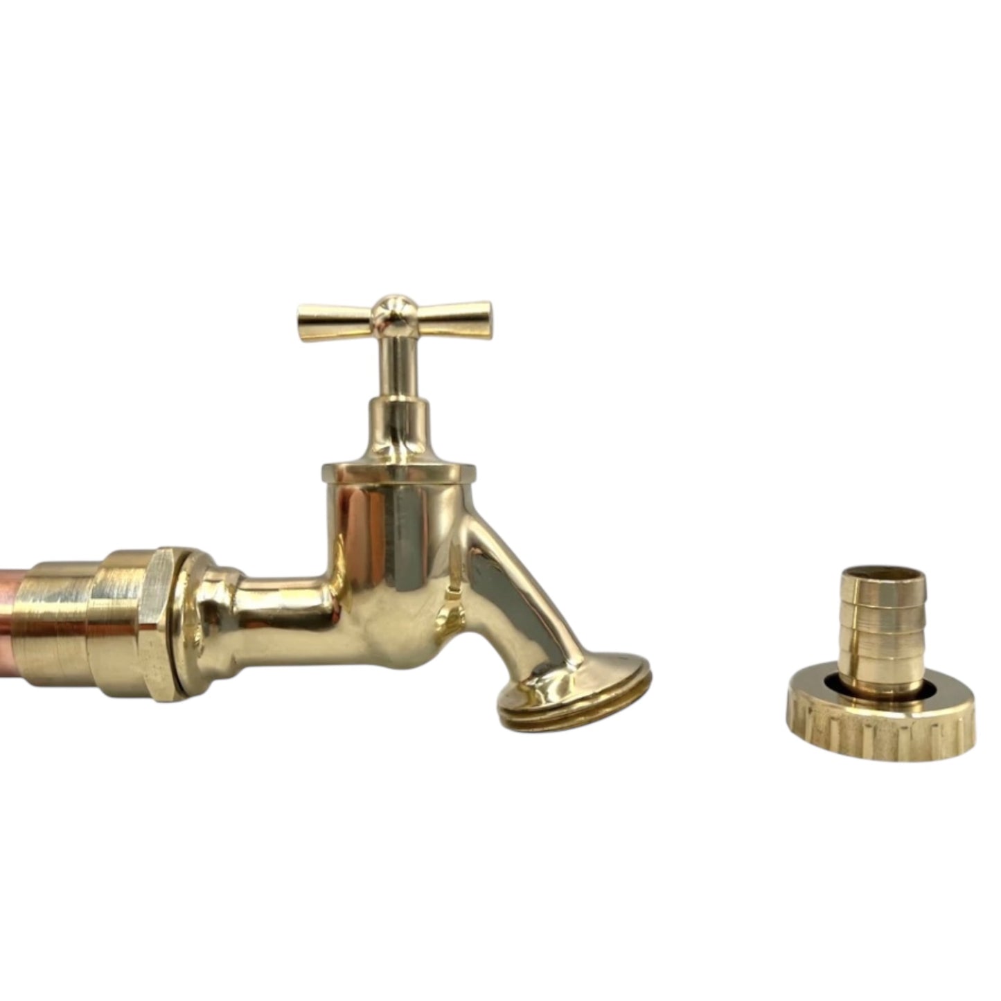 Brass and copper faucet tap on a white background