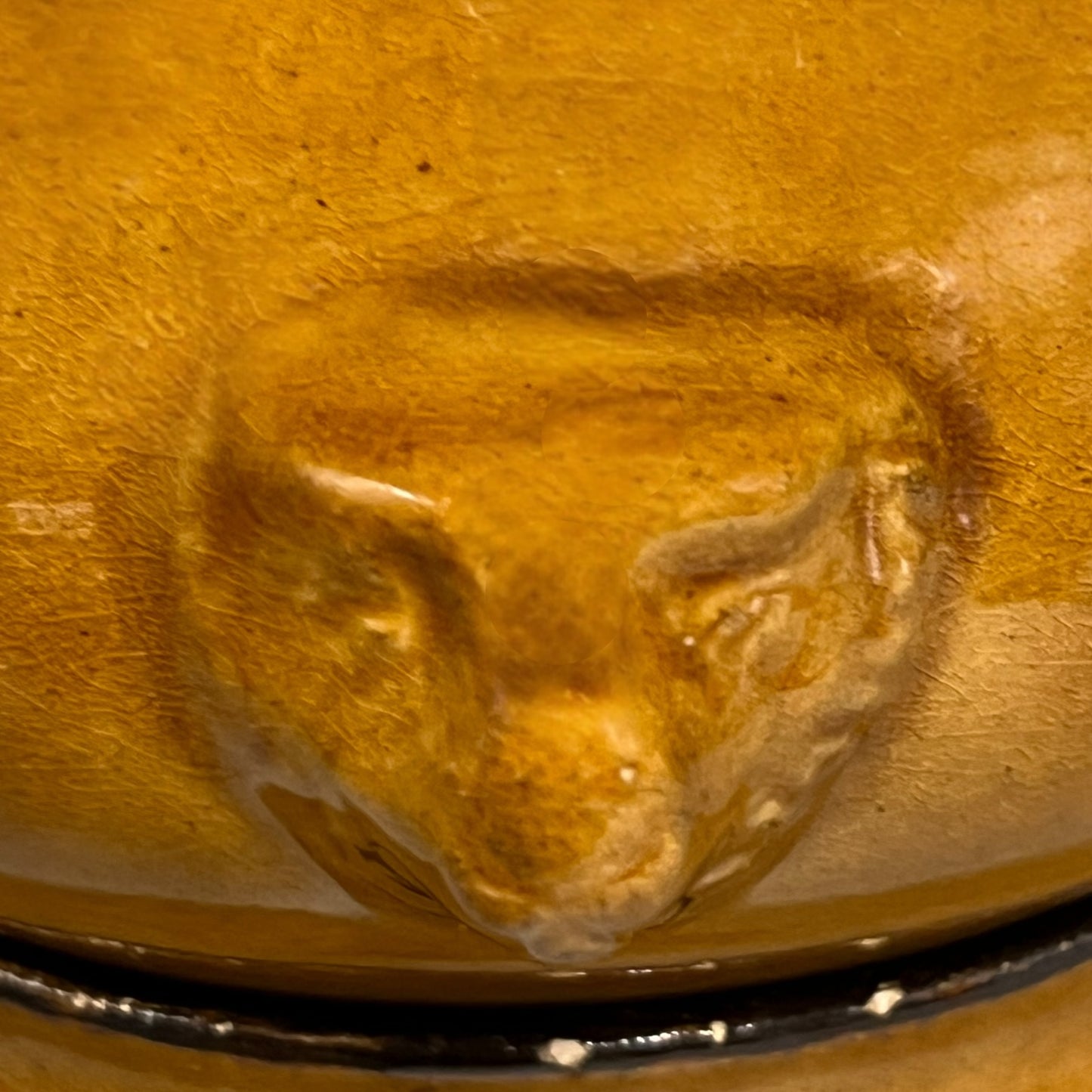 lions head handle of French onion soup bowl
