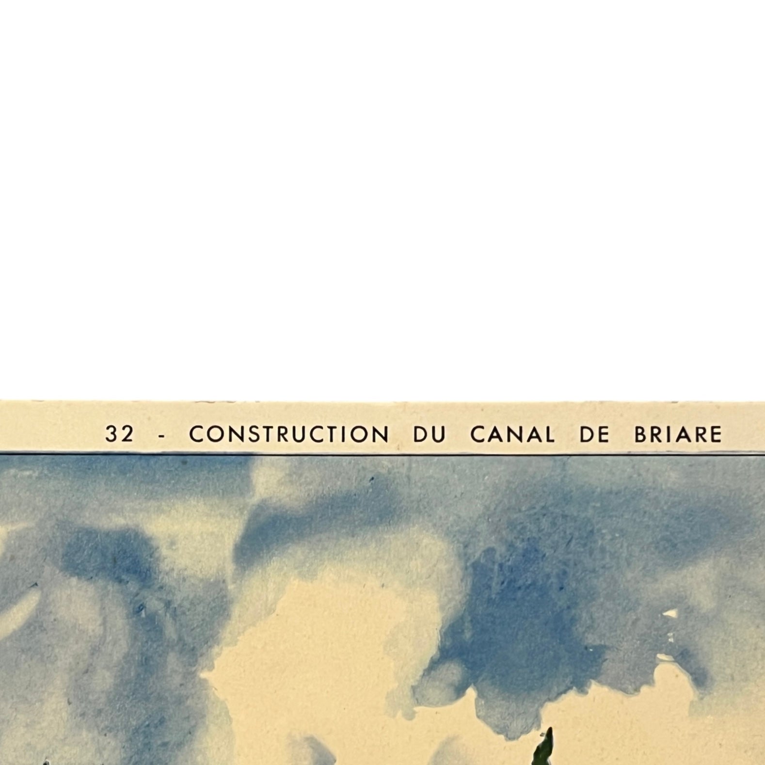 close up of corner of French school poster