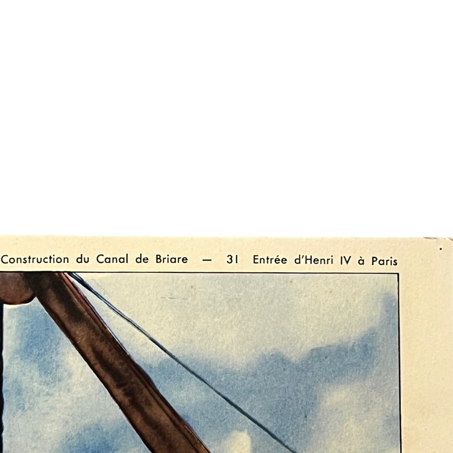 close up detail of corner of French school poster