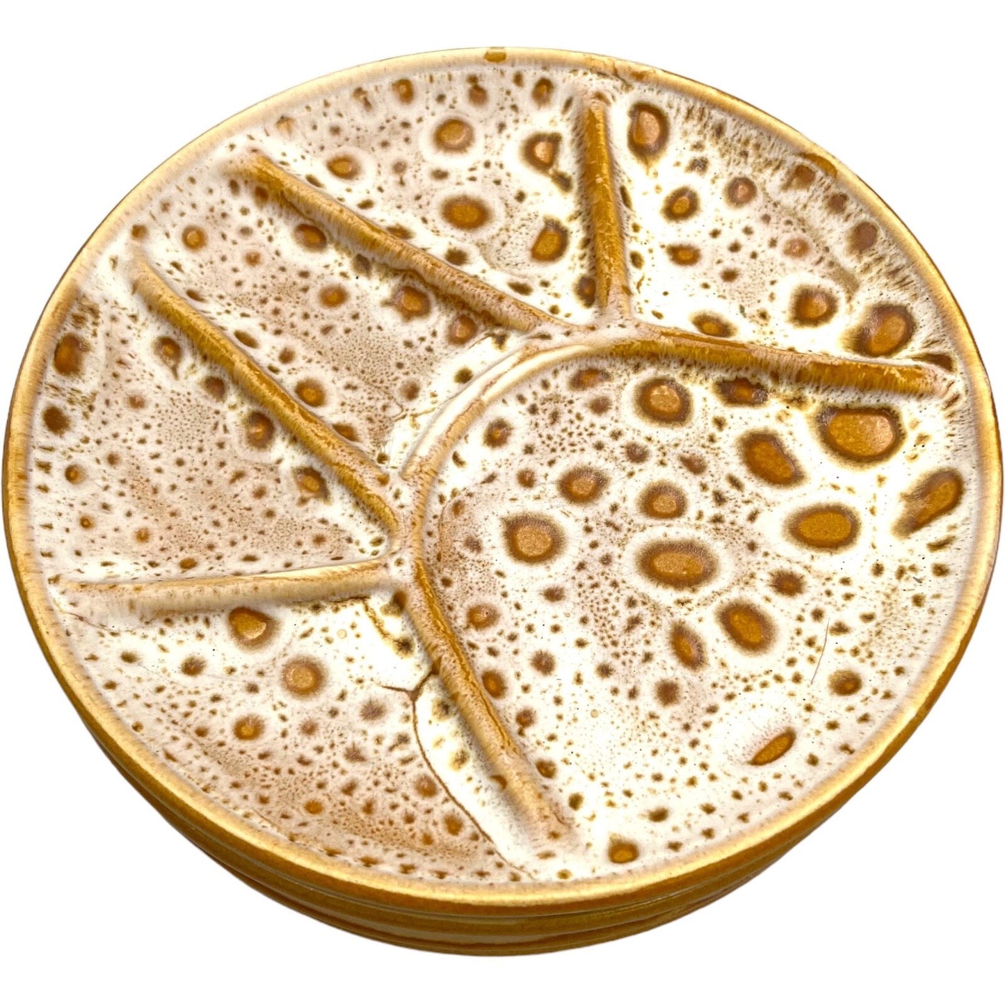 single amber and white speckled fondue plate made by Niderviller with 6 raised sections background
