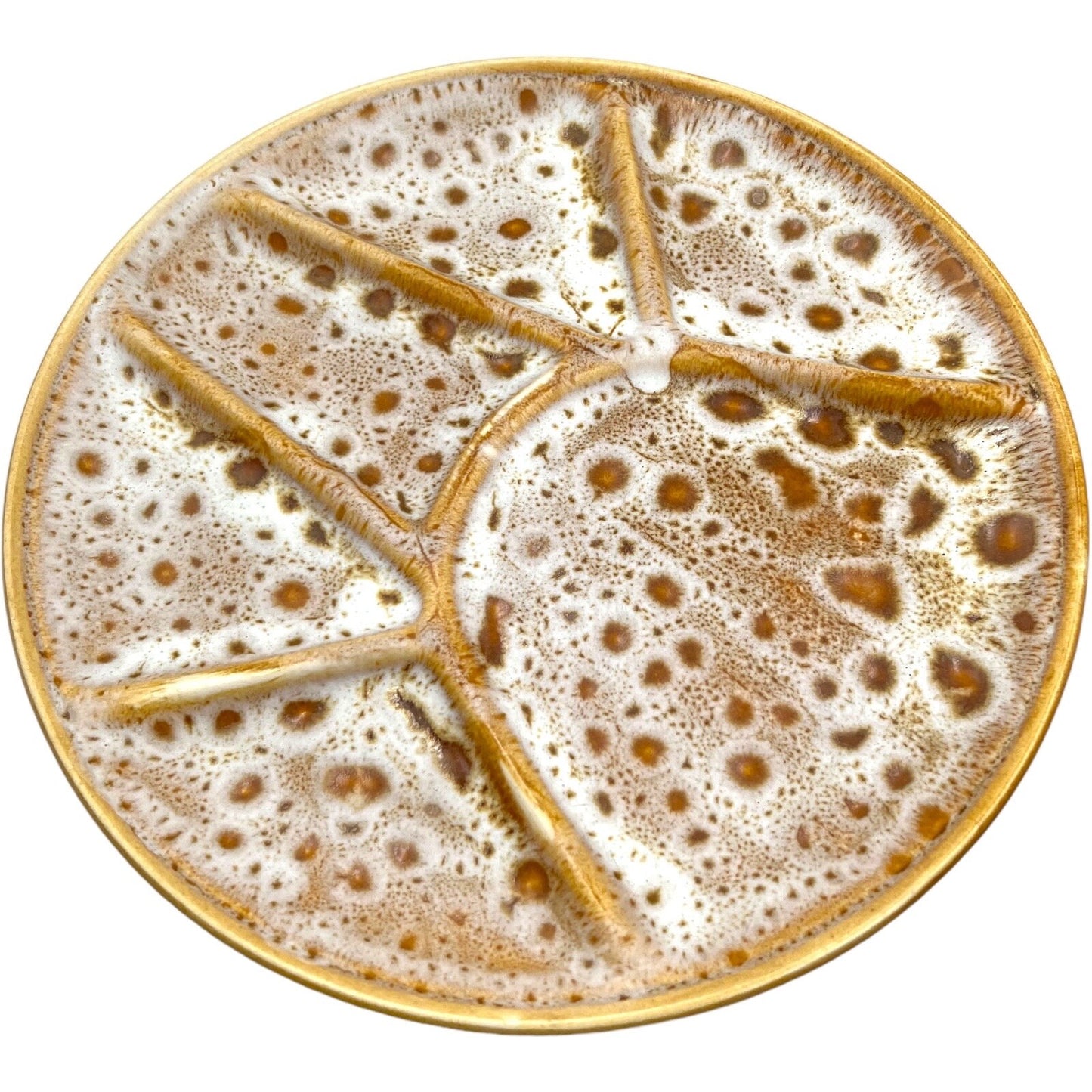 single amber and white speckled fondue plate made by Niderviller with 6 raised sections on a white background