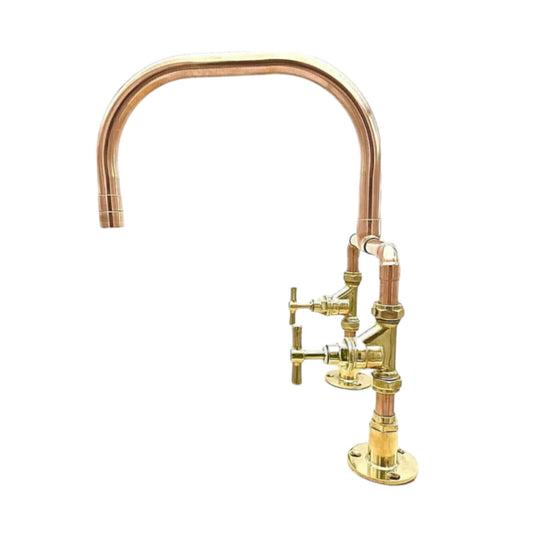 A copper and brass mixer tap with an arched spout and brass fittings, polished finish, against a white background for sale by All Things French Store.
