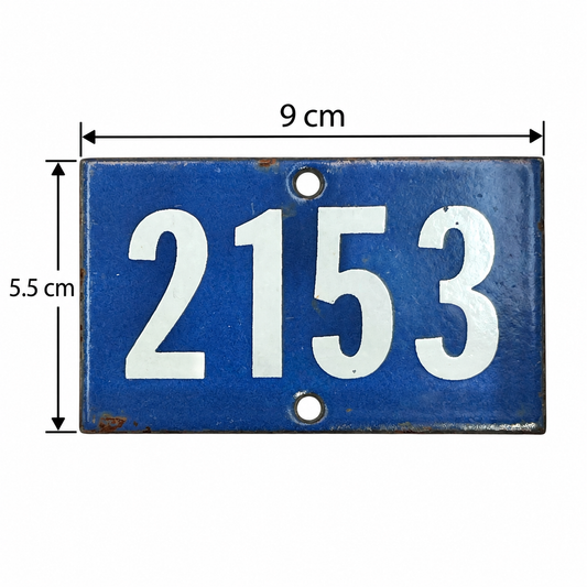 A blue rectangular metal house number plaque with the white numbers 2153, shown with dimension lines indicating 9 cm width and 5.5 cm height on a white background.