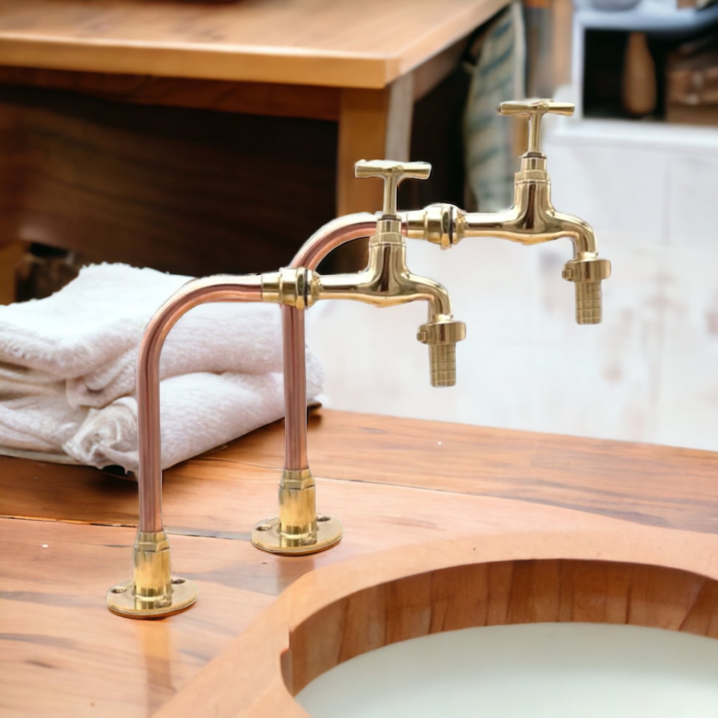 image pair of handmade copper and brass swan neck taps with detachable nozzle