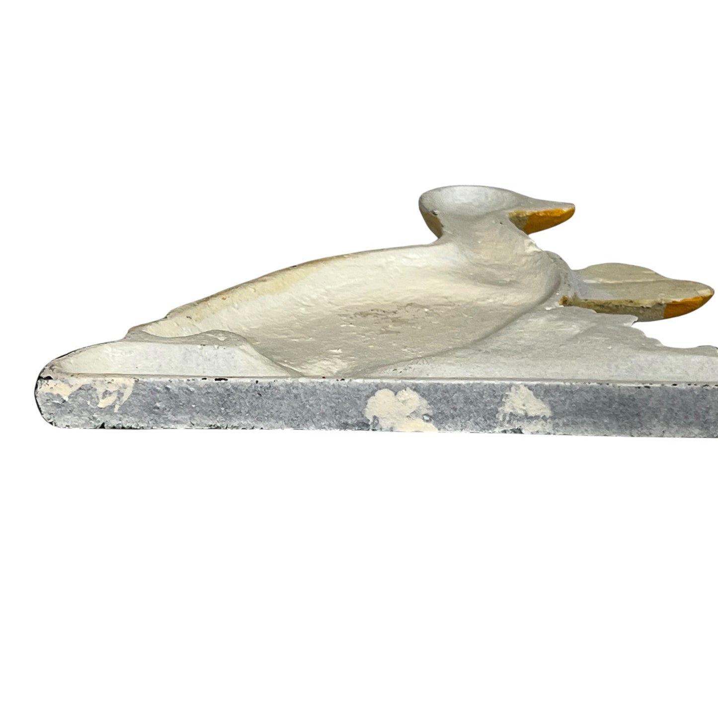 close up of goose toilet roll holder on a white background